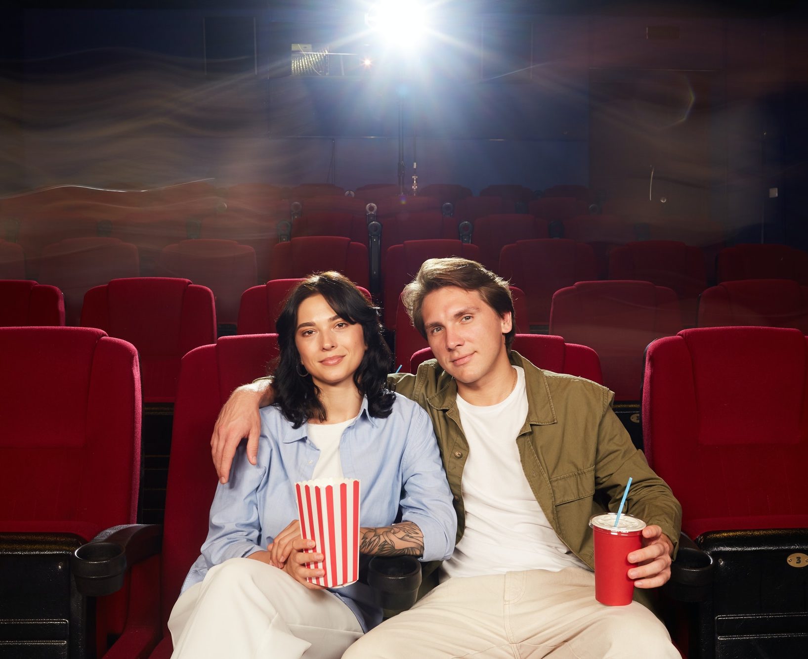 couple in empty cinema hall e1630568141724.jpg